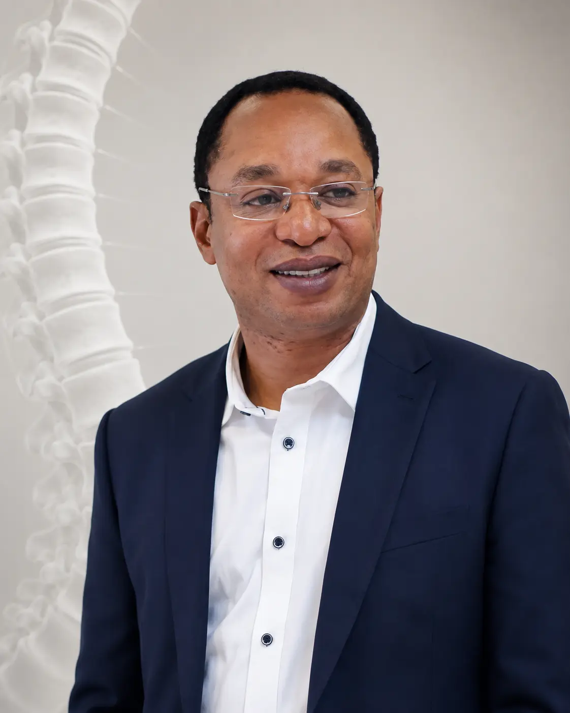 Mr. Taofiq Desmond Sanusi - Spine focus consultant london