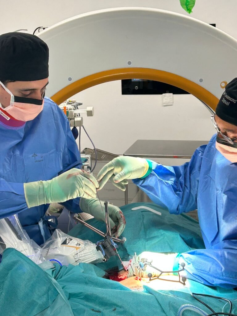 Successful robotic spine surgery depends on careful planning, surgical expertise and close collaboration between the operating team. Consultant spine surgeons performing robotic-assisted spinal surgery in the operating theatre