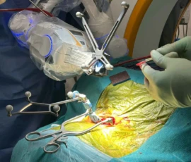 Minimally invasive spine surgery by consultant neurosurgeon Mr. Taofiq Desmond Sanusi in the operating theatre